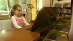 Alma Deutscher playing piano